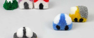 Napravite mali grad za igru od vunenih pufnica