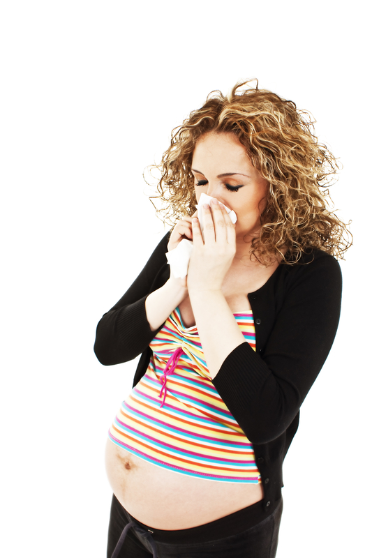 http://www.dreamstime.com/stock-image-sneezing-pregnant-woman-image19299861
