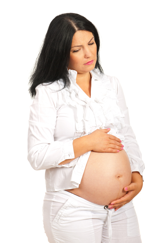 http://www.dreamstime.com/royalty-free-stock-photo-sad-pregnant-woman-stomach-ache-image27719355