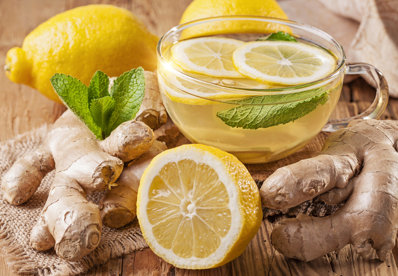 http://www.dreamstime.com/stock-photos-ginger-tea-lemon-wooden-table-image39754423