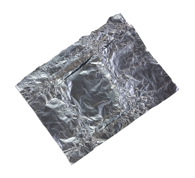 http://www.dreamstime.com/royalty-free-stock-image-scrap-tin-foil-white-background-small-used-image33583966