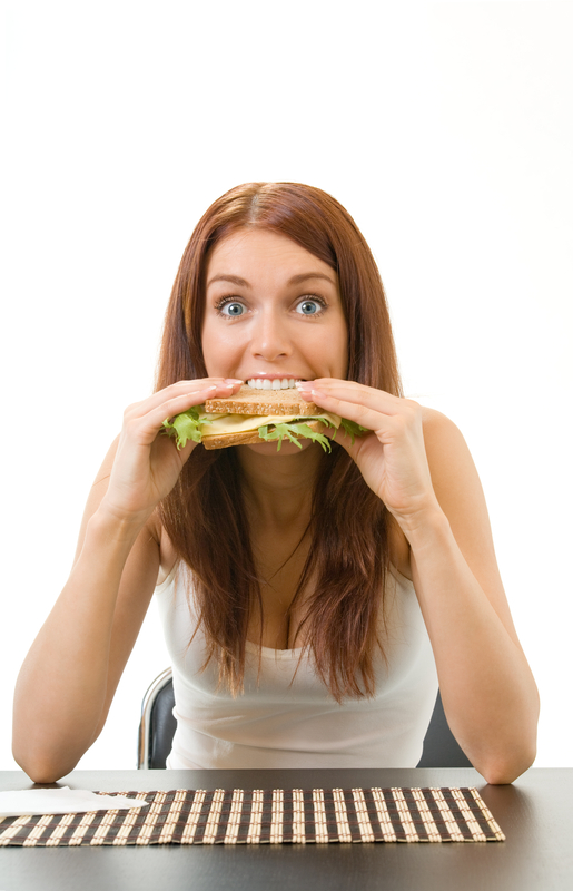 http://www.dreamstime.com/royalty-free-stock-photography-hungry-gluttonous-woman-eating-image6451557