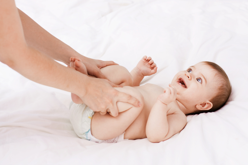 http://www.dreamstime.com/royalty-free-stock-images-mother-massaging-exercise-her-baby-image22270009