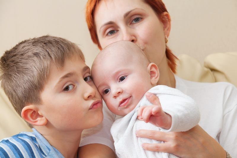 http://www.dreamstime.com/stock-photo-happy-mother-two-children-image27325660