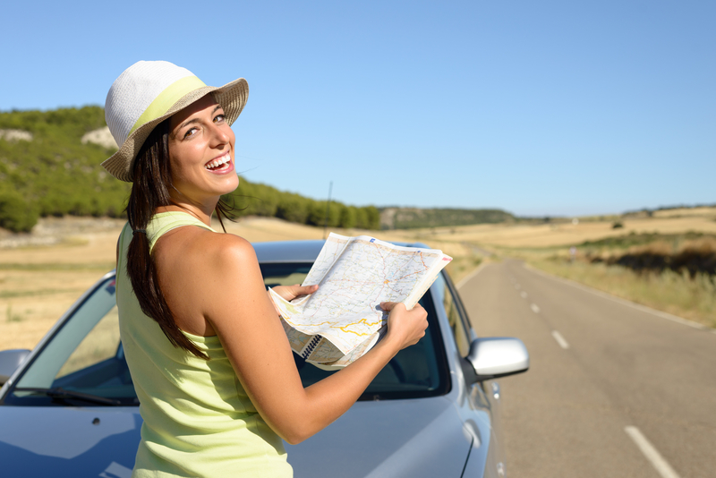 http://www.dreamstime.com/stock-image-woman-road-trip-looking-map-young-car-travel-spain-brunette-hispanic-girl-having-fun-summer-journey-image34455541