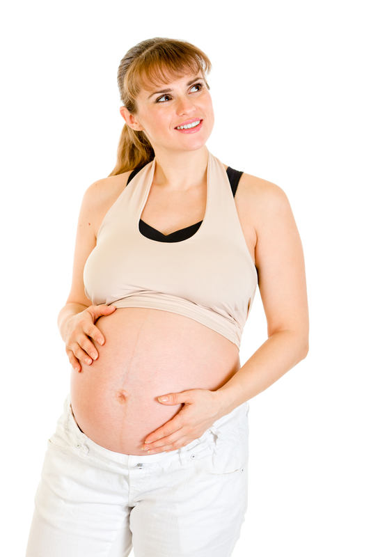 http://www.dreamstime.com/stock-image-dreaming-pregnant-woman-touching-her-belly-image17960241