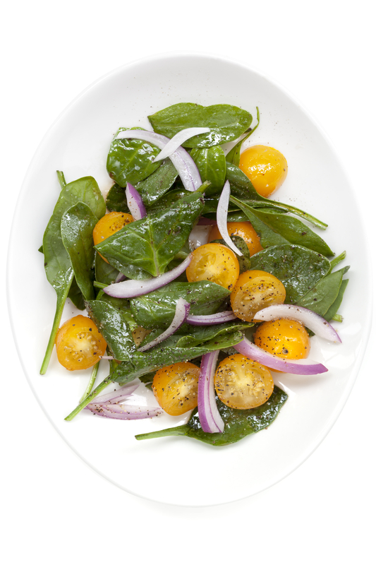 http://www.dreamstime.com/stock-photography-spinach-tomato-salad-yellow-white-plate-overhead-view-isolated-image38542002
