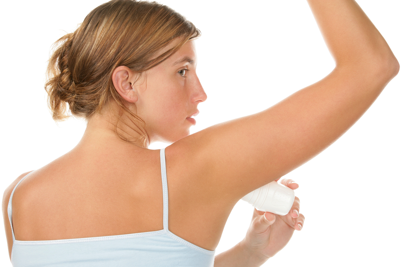http://www.dreamstime.com/royalty-free-stock-photo-woman-using-deodorant-image11240795