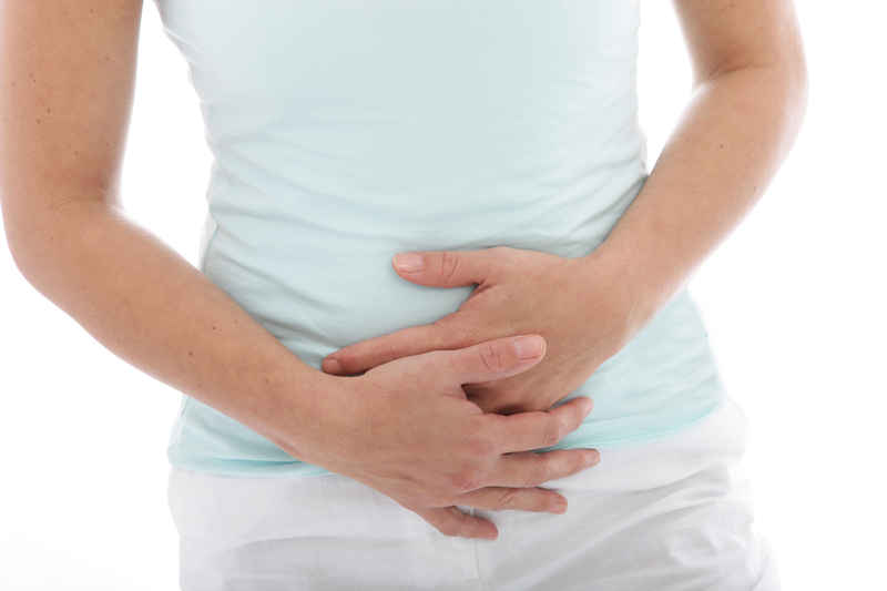 http://www.dreamstime.com/stock-image-woman-stomach-pain-cropped-view-hands-clutching-her-isolated-white-image30682241