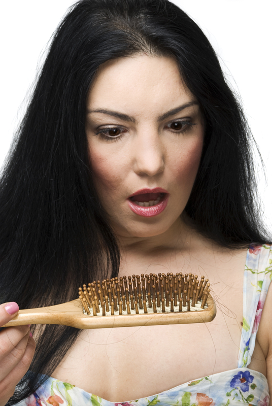 http://www.dreamstime.com/stock-image-shocked-woman-loss-hair-hairbrush-image12697021