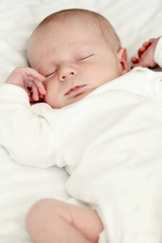 http://www.dreamstime.com/stock-photography-sleeping-newborn-baby-image23982602
