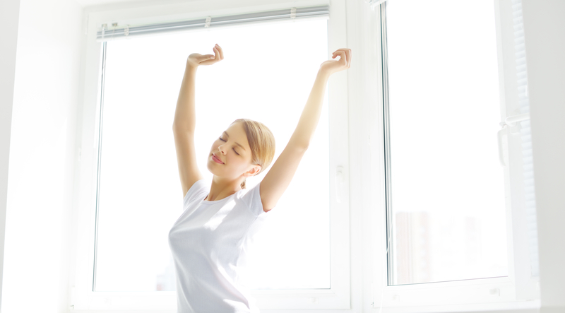 http://www.dreamstime.com/royalty-free-stock-photography-girl-stretching-morning-young-waking-up-background-window-image31343837