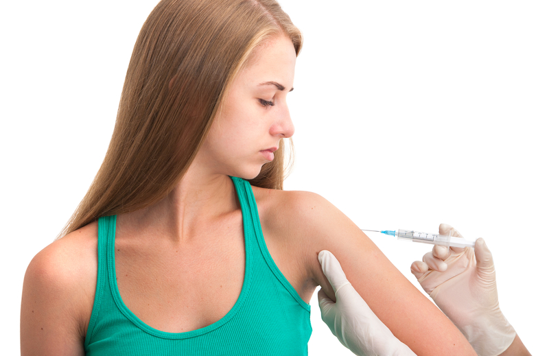 http://www.dreamstime.com/stock-image-vaccination-shot-doctor-making-insulin-flu-syringe-to-young-woman-image33620771