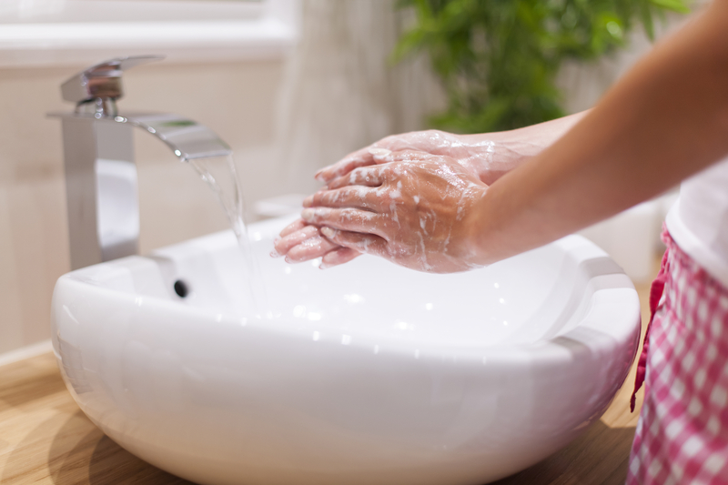 http://www.dreamstime.com/royalty-free-stock-images-washing-hands-close-up-woman-bathroom-image43077519