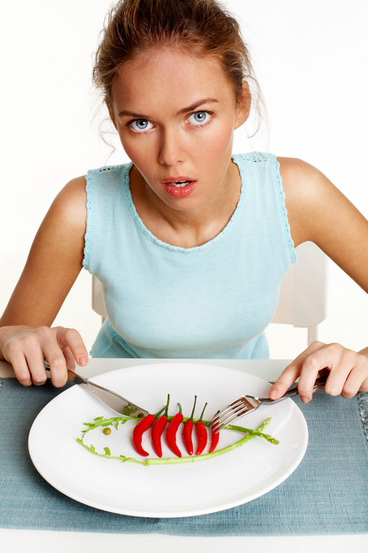http://www.dreamstime.com/stock-photos-too-spicy-vertical-portrait-slender-girl-keeping-to-diet-image33213423