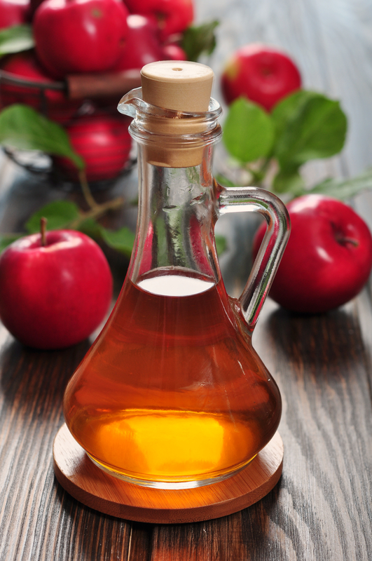http://www.dreamstime.com/royalty-free-stock-photography-apple-cider-vinegar-glass-bottle-basket-fresh-apples-image33174347
