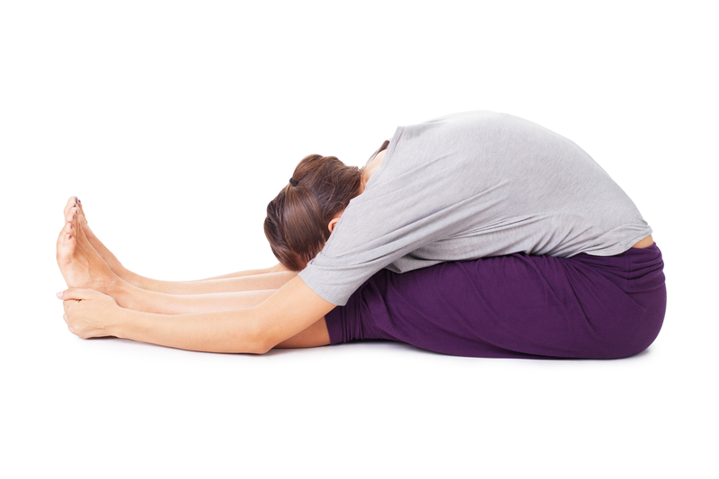 http://www.dreamstime.com/stock-photo-young-woman-doing-yoga-asana-seated-forward-bend-paschimottanasa-image29635070