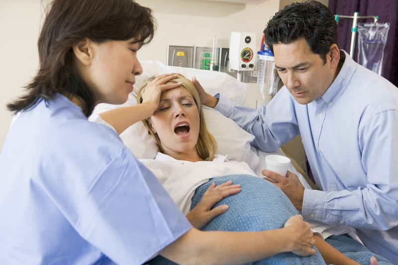 http://www.dreamstime.com/stock-photos-woman-giving-birth-image6430833