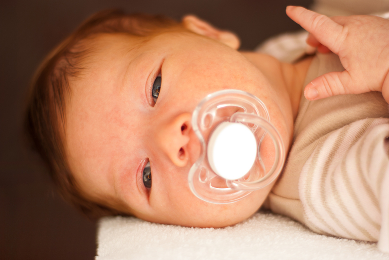 http://www.dreamstime.com/stock-images-newborn-baby-pacifier-image29546824