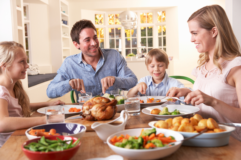 http://www.dreamstime.com/royalty-free-stock-images-happy-family-having-roast-chicken-dinner-table-image18044089