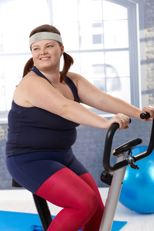 http://www.dreamstime.com/royalty-free-stock-photos-fat-woman-exercise-bike-image24589818