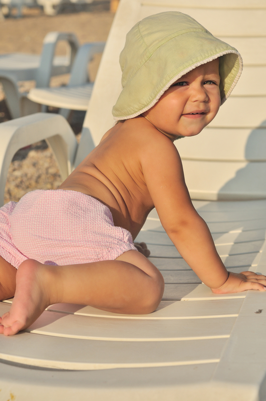 http://www.dreamstime.com/royalty-free-stock-photos-cute-baby-beach-sitting-sun-lounger-image35551998