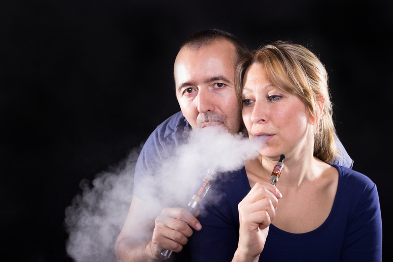http://www.dreamstime.com/royalty-free-stock-photos-couple-electronic-cigarettes-enjoying-e-cigarette-together-image35877618