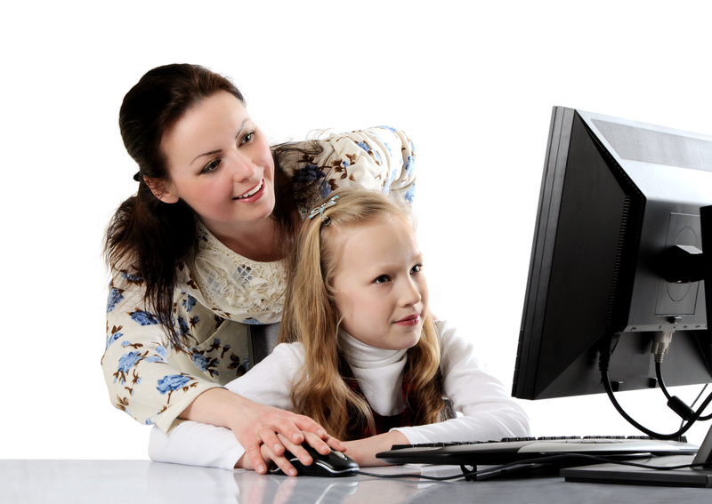 http://www.dreamstime.com/stock-image-mother-daughter-using-computer-image24062621