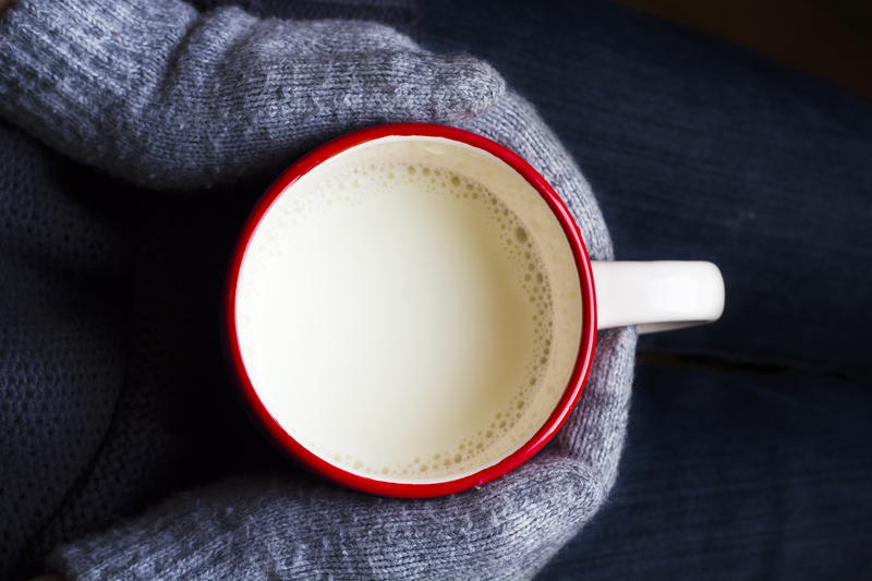 http://www.dreamstime.com/stock-photography-cup-milk-hand-gloves-image28231632