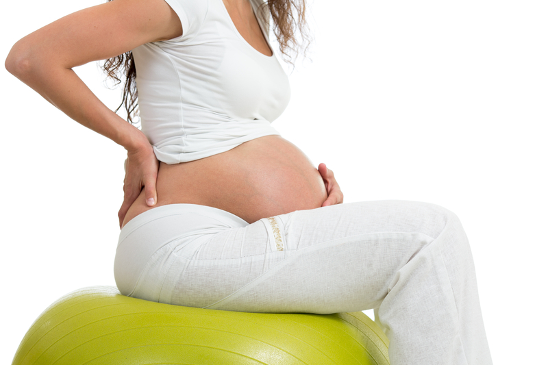 http://www.dreamstime.com/stock-photos-pregnant-woman-sitting-fit-ball-hand-her-back-isolated-image33866303