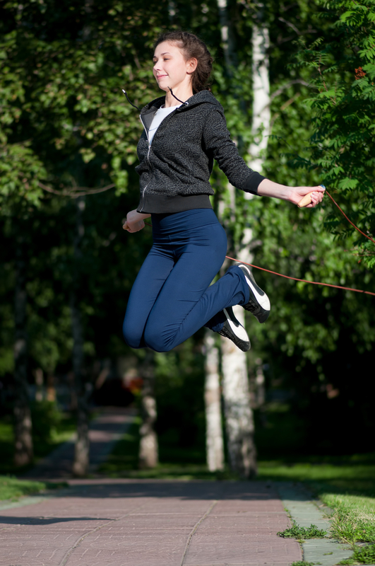 http://www.dreamstime.com/royalty-free-stock-image-jumping-woman-skipping-rope-park-image18133576