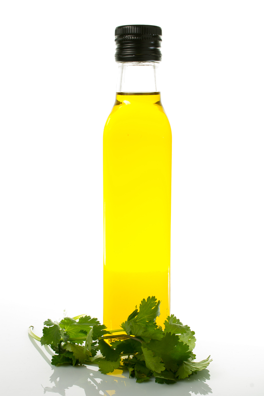 http://www.dreamstime.com/stock-image-bottle-olive-oil-fresh-cilantro-white-background-image30049251