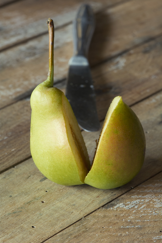 http://www.dreamstime.com/royalty-free-stock-photography-delicious-ripe-sliced-pear-wooden-table-image32140227