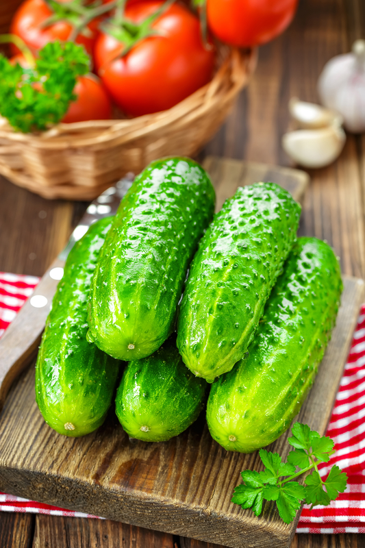 http://www.dreamstime.com/stock-photography-cucumbers-tomatoes-table-image40163462