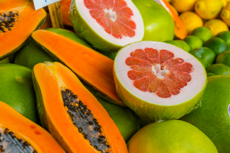 http://www.dreamstime.com/royalty-free-stock-photo-grapefruit-papaya-display-colorful-market-cut-open-showing-inside-image35260815