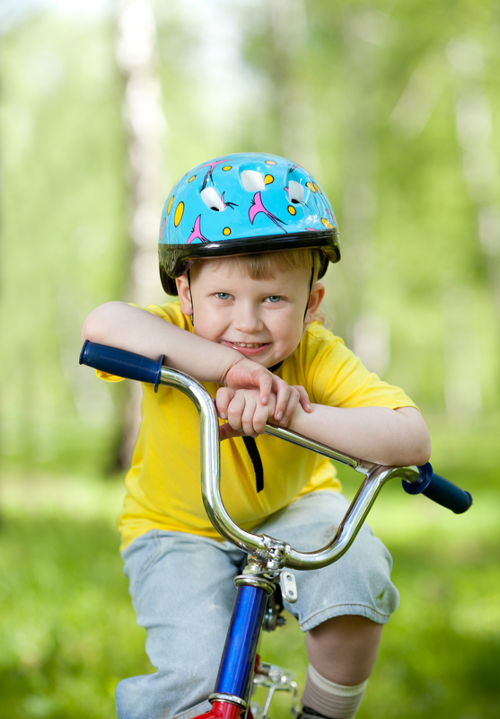 http://www.dreamstime.com/royalty-free-stock-photos-nice-kid-weared-helmet-bicycle-image25061218