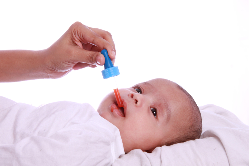 http://www.dreamstime.com/royalty-free-stock-image-small-baby-taking-vitamin-medicine-image29152136