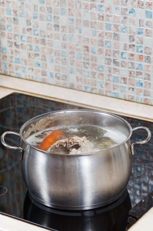 http://www.dreamstime.com/stock-image-simmering-chicken-broth-cooker-seasoning-vegetables-steel-pot-glass-ceramic-image35396451