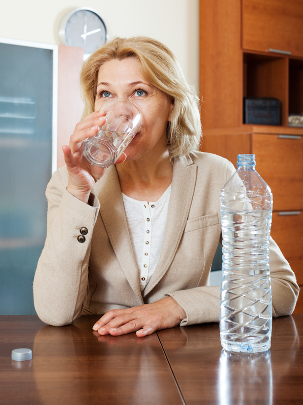 http://www.dreamstime.com/royalty-free-stock-image-blonde-mature-woman-drinking-water-glass-home-image42255796