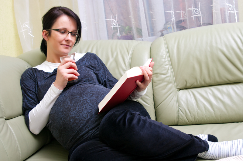 http://www.dreamstime.com/stock-photos-pregnant-woman-reading-image14007133