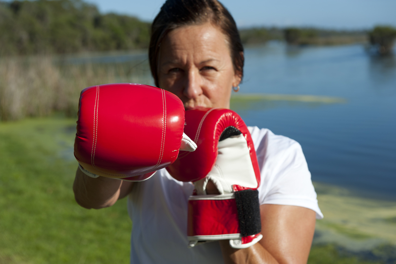 http://www.dreamstime.com/stock-photos-woman-boxing-gloves-image21906633