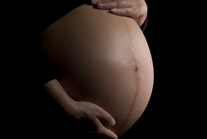 http://www.dreamstime.com/stock-photo-pregnant-belly-image25395580