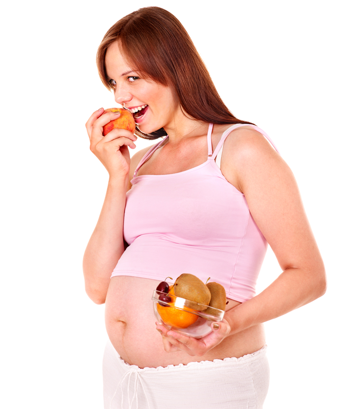 http://www.dreamstime.com/royalty-free-stock-photography-pregnant-woman-eating-fruit-image26060347