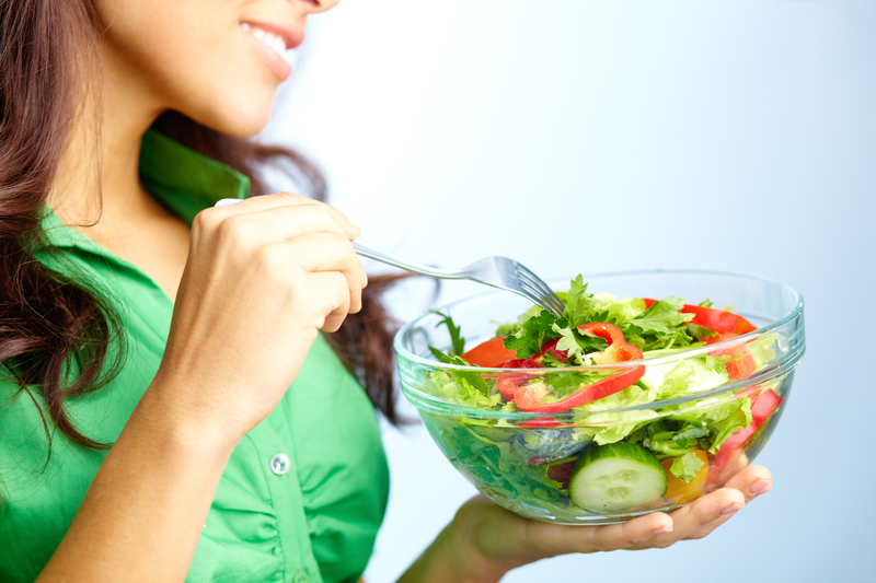 http://www.dreamstime.com/royalty-free-stock-photography-eating-salad-close-up-pretty-girl-fresh-vegetable-image30954637