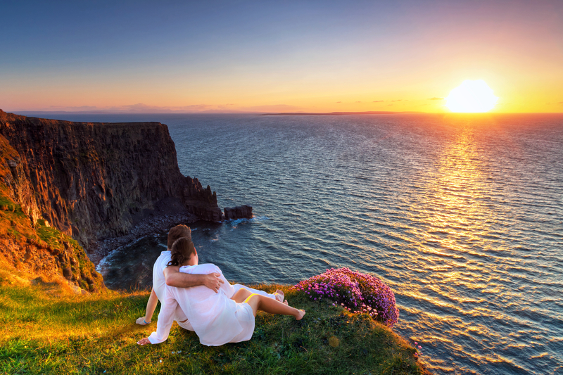 http://www.dreamstime.com/royalty-free-stock-photos-couple-hug-watching-sunset-edge-cliff-image31352068