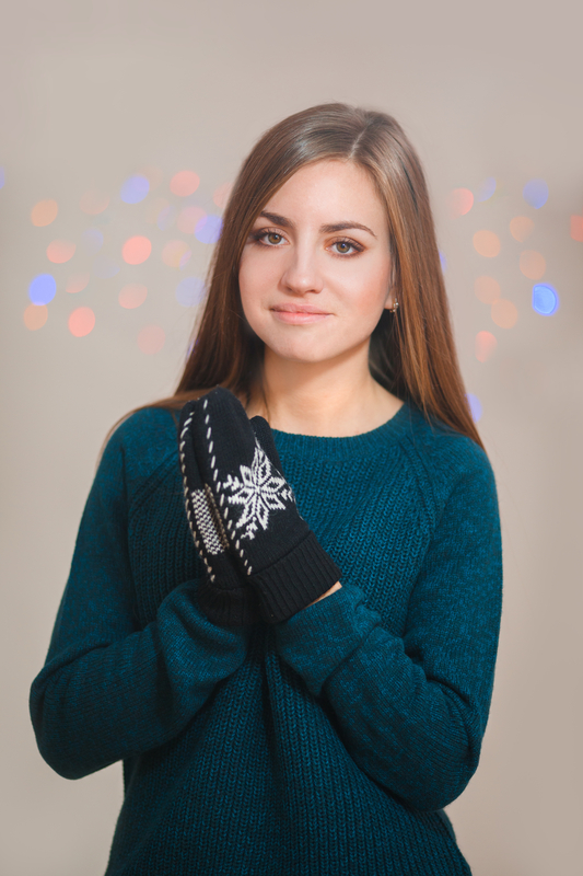 http://www.dreamstime.com/stock-photography-beautiful-woman-wearing-winter-gloves-grey-background-image34472352