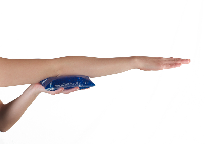 http://www.dreamstime.com/royalty-free-stock-image-holding-ice-gel-pack-elbow-medical-concept-photo-woman-image39252856