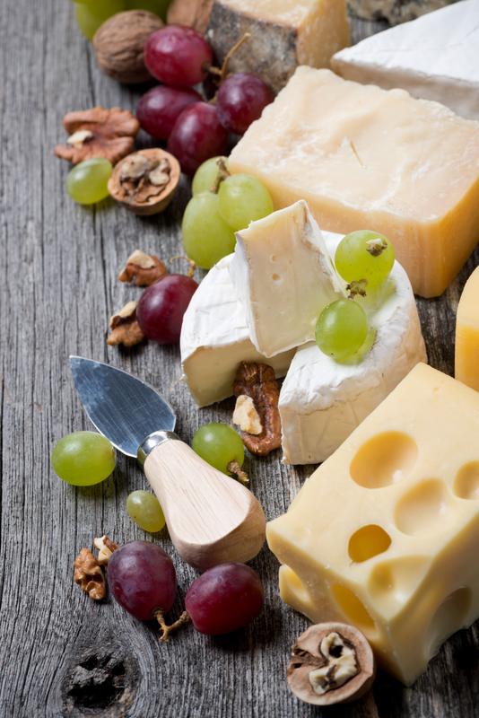 http://www.dreamstime.com/stock-photography-cheeses-grapes-walnuts-wooden-background-top-view-vertical-image40199592